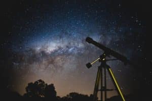 Telescope against a dark sky