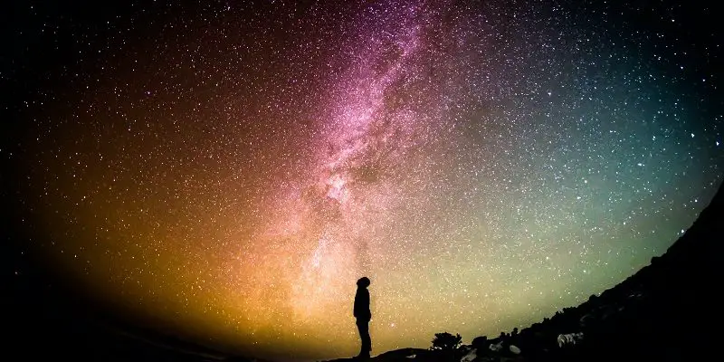 silhouette of person looking at milky way space astronomy for kids